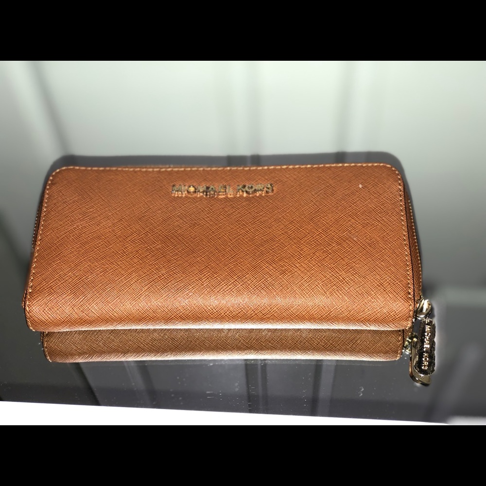 Michael Kors wallet. Used but good condition.